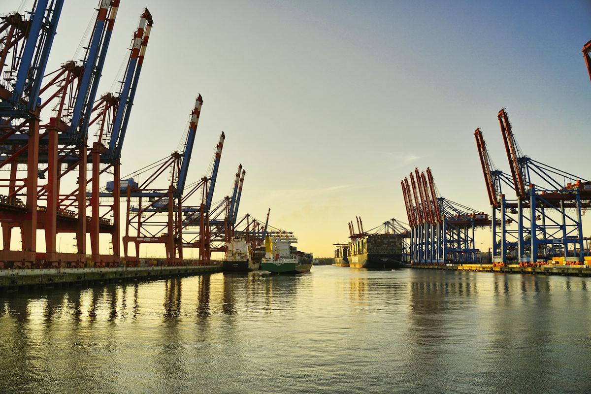 Port cranes at dusk